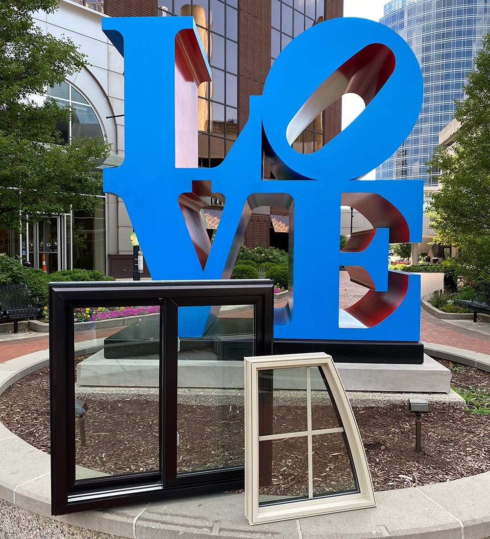 Love sculpture in Grand Rapids with replacement windows in the foreground