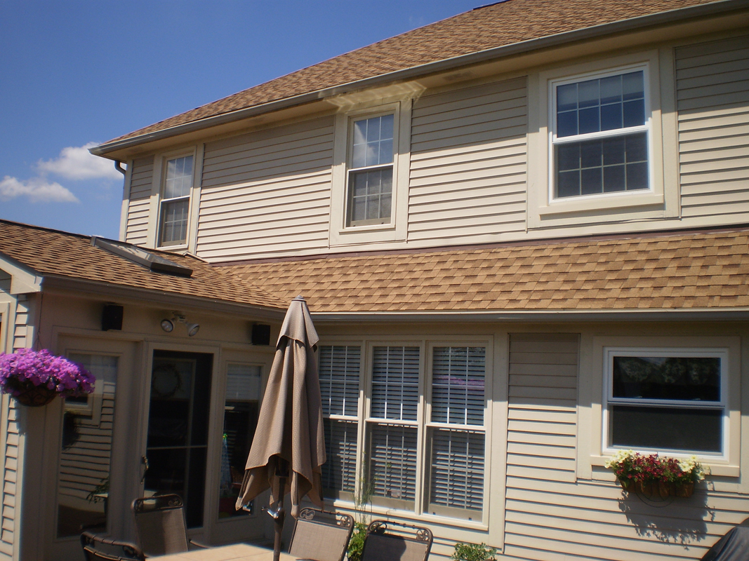 The Bendons house, backyard view of the house and new windows